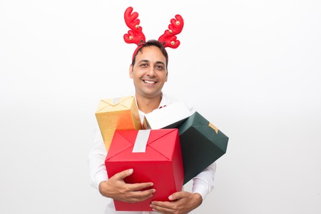 Man Wearing Reindeer Horns and Holding Gift Boxesの写真素材