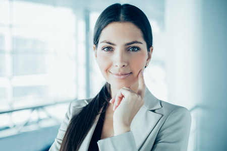 Thoughtful Pretty Middle-aged Business Womanの写真素材