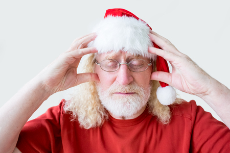 Senior Man with Closed Eye Thinking Intensivelyの写真素材