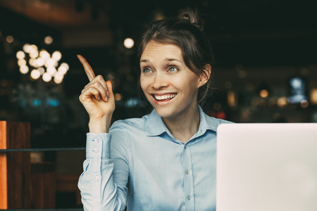 Cheerful businesswoman having ideaの写真素材