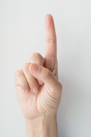 Closeup of One Finger Up