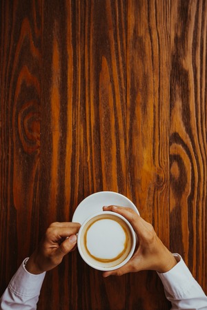 Businessman waiting for colleague in coffee shop