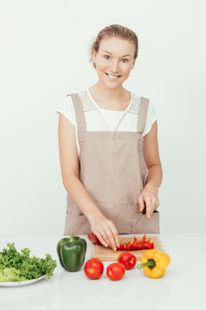 Happy perfect housewife taking care of healthの写真素材