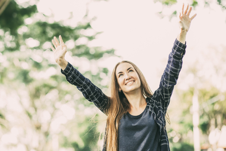 Optimistic attractive girl enjoying good weatherの写真素材