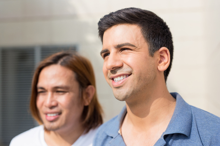 Closeup of Two Happy Young Handsome Men Outdoorsの写真素材