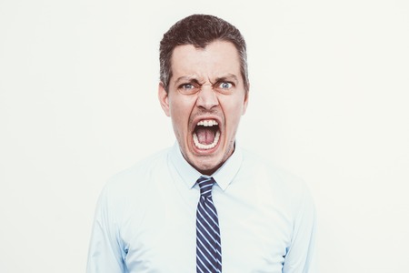 Furious Middle-aged Business Man Screamingの写真素材