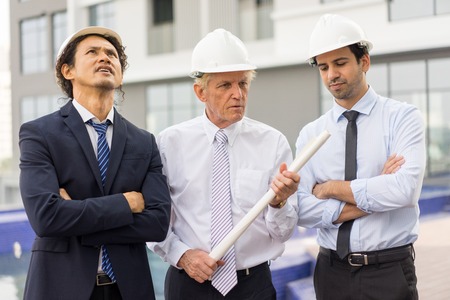 Serious Architects Meeting at Construction Siteの写真素材