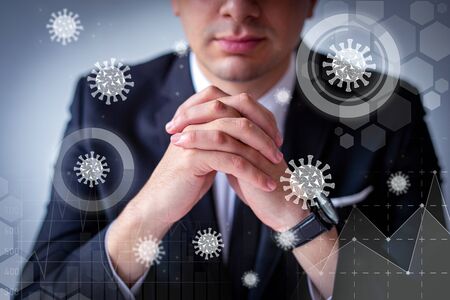 Businessman with clasped hands and virtual virology graphics. Entrepreneur wearing suit and watch....