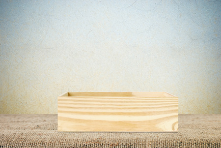 Wood storage box on table background, product display montage