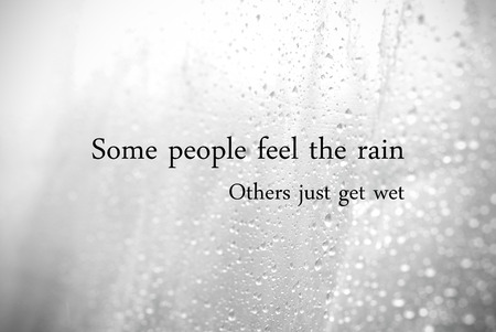 Some people feel the rain, other just get wet : inspirational quotation, lifestyleの写真素材