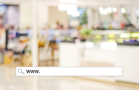 Word www. written on search bar over blur restaurant background, web banner, restaurant reservation, food online, food delivery conceptの写真素材
