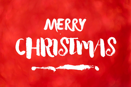 Merry christmas on red blur abstract backgroundの写真素材