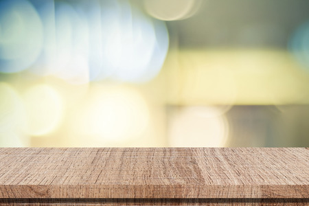 Empty table over blur festive bokeh background, product display, templateの写真素材