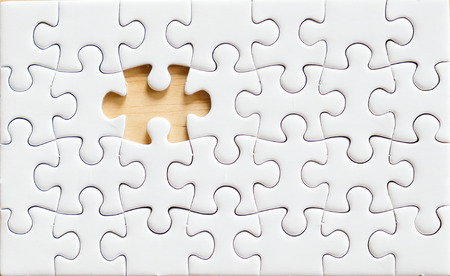 Jigsaw puzzle on wood, background, business concept, flat layの写真素材