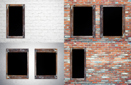 Mixed blank vintage chalk boards on wall background for textの写真素材