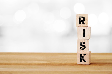Risk word on wooden cubes, business concept backgroundの写真素材