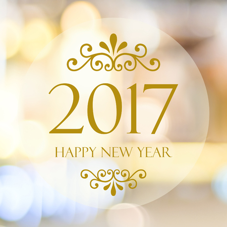 Happy New Year 2017 year on abstract blur festive bokeh background