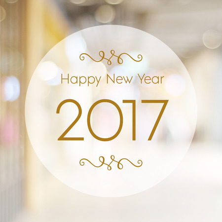 Happy New Year 2017 year on abstract blur festive bokeh background
