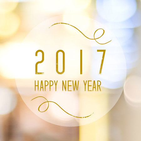 Happy New Year 2017 year on abstract blur festive bokeh background
