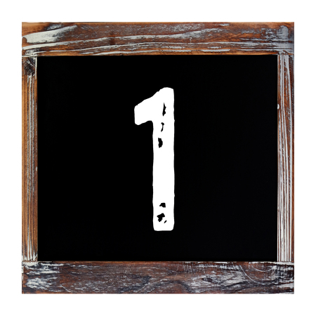 Number 1, one, on vintage wooden chalkboard isolated on white background, education concept