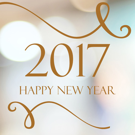 Happy New Year 2017 year on abstract blur festive bokeh background