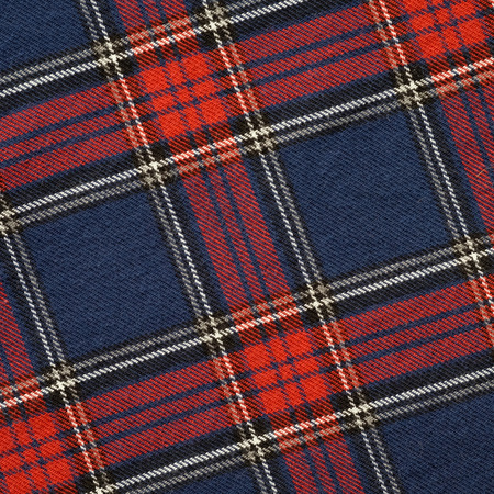 Red and navy scottish pattern texture fabric background, fashion concept