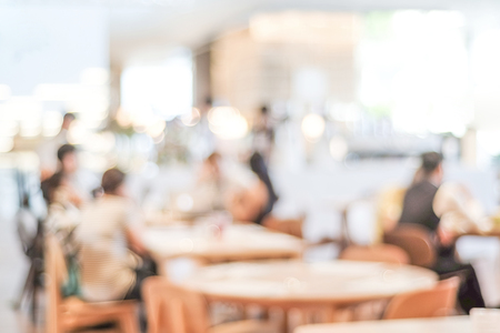 Blurred background : blur restaurant with people on bokeh light backgroundの写真素材