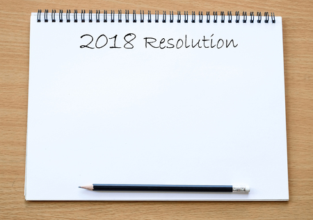 2018 resolution on blank paper notebook background, with copy space for text, business background conceptの写真素材