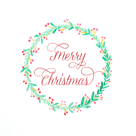 Merry Christmas wreath watercolor drawing on white paper background, Christmas greeting card backgroundの写真素材