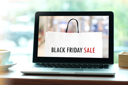 Laptop computer with black friday sale on screen background, holiday shopping online, digital marketing, business and technology, lifestyle conceptの写真素材