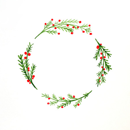 Christmas wreath watercolor drawing on white paper background, Christmas greeting card backgroundの写真素材
