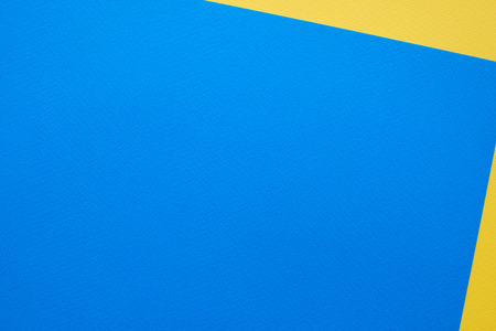 Blank blue and yellow paper texture background, art and design backgroundの写真素材