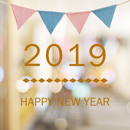 Happy New Year 2019 year on abstract blur festive bokeh background
