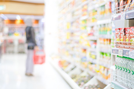 Blurred background, Blur people shopping at product shelf in supermarket background, business conceptの写真素材