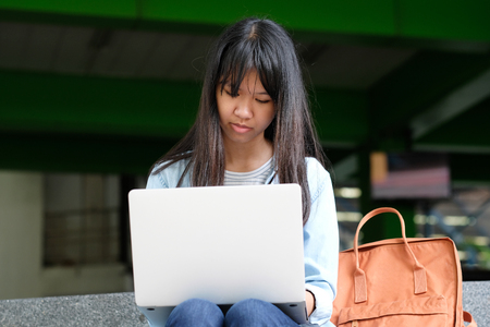 Student girl using laptop computer, online education,  adult learning conceptの写真素材