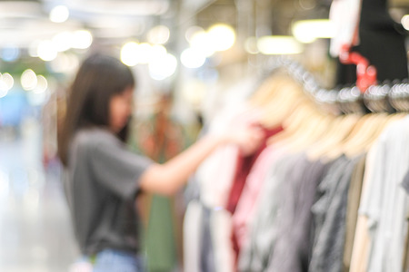 Blurred background, Blur store with people and bokeh light, business backgroundの写真素材