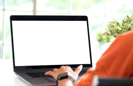 Laptop computer screen mockup, template background, Woman hand typing laptop computer with blank...