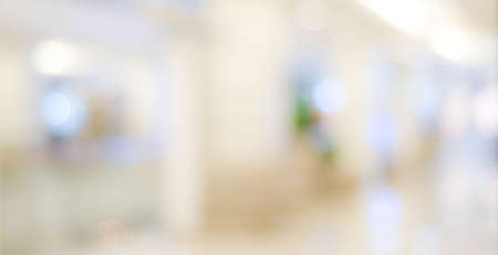 Blur retail store shop background, Blurred product shelf backdrop copy space for business display advertise banner, Blurry abstract bokeh light wallpaper, poster with copy spaceの写真素材