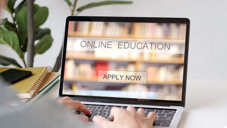 Study online class, Man hand typing on laptop computer while apply for learning online course,...