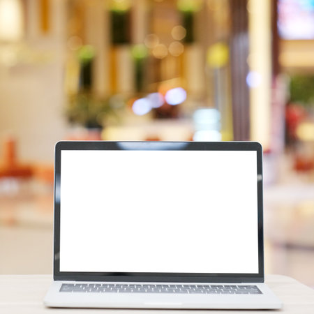 Laptop computer screen mockup, template background, Laptop computer with blank screen over blur...