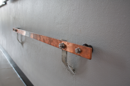 Copper ground bar in electrical substationの写真素材