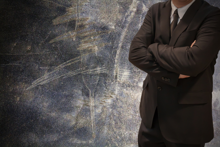 Business man with cement texture backgroundの写真素材