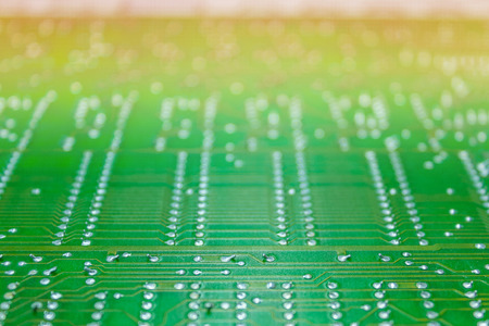 Electronic component with green circuit board close up for backgroundの写真素材