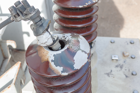 damage electrical insulator of old transformer