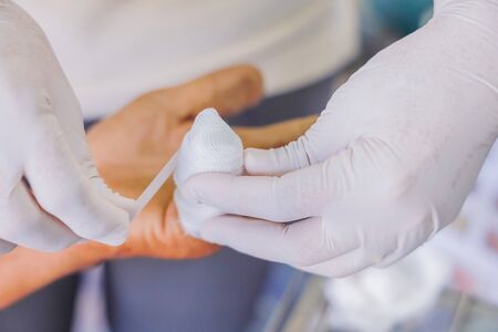 dressing patient finger infected wound