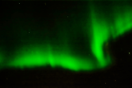 Polar lights in the night sky. Multicolored auroras of various shapes. Night shooting.の写真素材