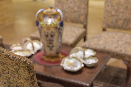 Moscow / Russia - February 18 2020: Blurred image of the interior with antique furniture and utensils. Ceramics and furniture in Breton style.のeditorial素材