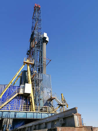 General view of the construction of a drilling rig for drilling oil and gas wells. Oil rig,...