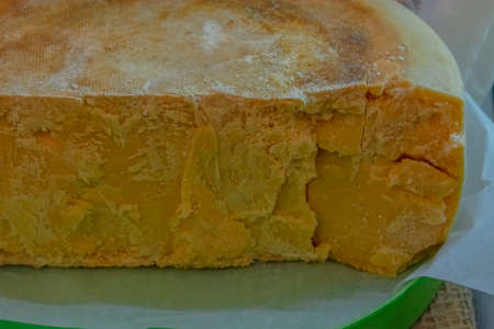 Various varieties of hard cheese. Mold free and mold free. Cut and whole.