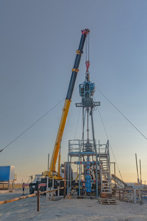 The Northern gas field. Summer. Installation for lowering a flexible pipe into a well. Equipment for...